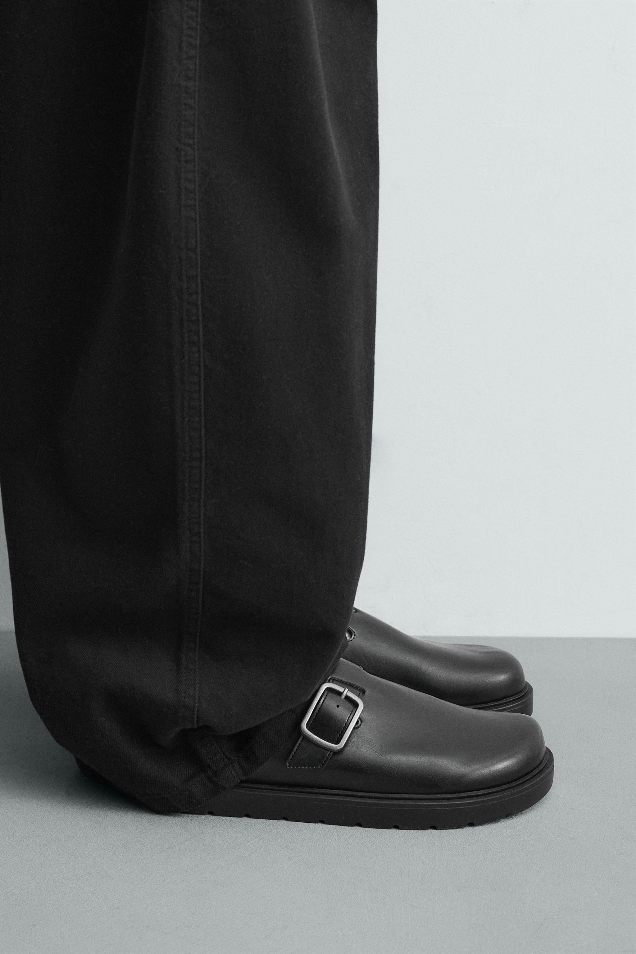BUCKLE CLOGS